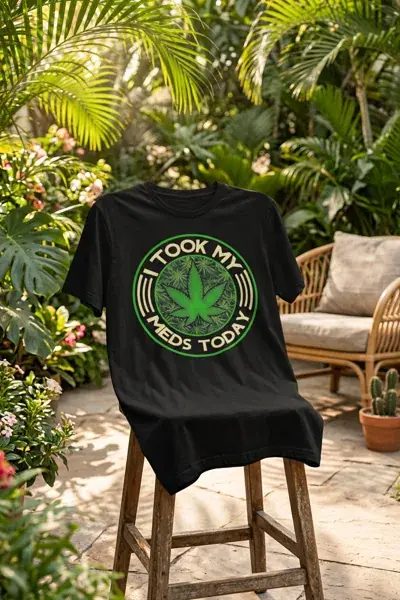 Black t-shirt printed with a circular I Took My Meds Today badge